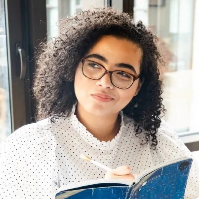 young woman holding books