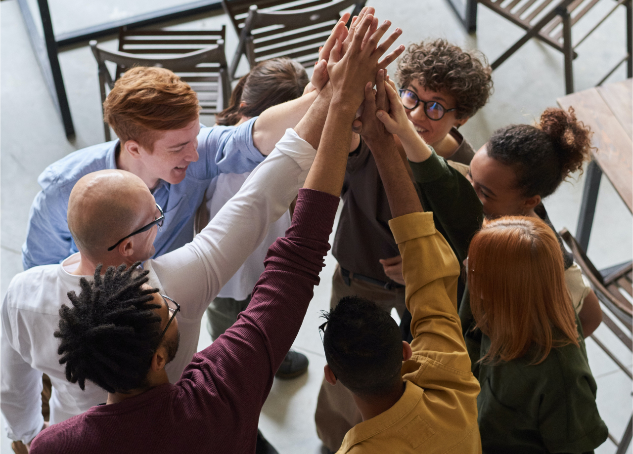 a group of people giving a cheer