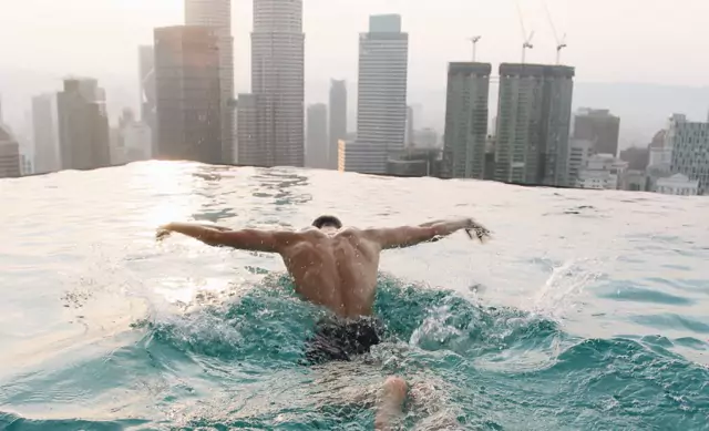 swimmer in an infinity pool